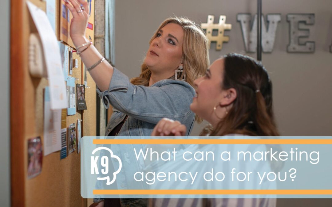 Klout9 Marketing Agency Team Members strategizing for a new client.